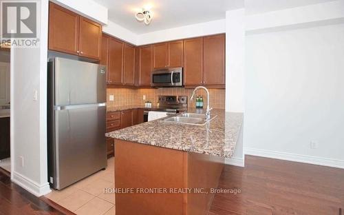 910 - 10 Bloorview Place, Toronto, ON - Indoor Photo Showing Kitchen With Double Sink