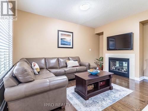 450 Summerlyn Trail, Bradford West Gwillimbury, ON - Indoor Photo Showing Living Room With Fireplace