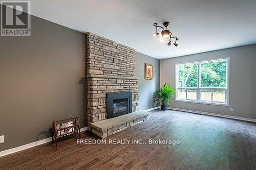 94 Lewis Drive, Orillia, ON - Indoor Photo Showing Living Room With Fireplace