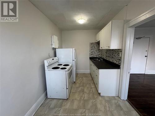 1250 Ouellette Unit# 202, Windsor, ON - Indoor Photo Showing Laundry Room