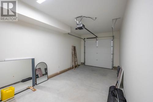 158 Deer Place Unit# 106, Penticton, BC - Indoor Photo Showing Garage