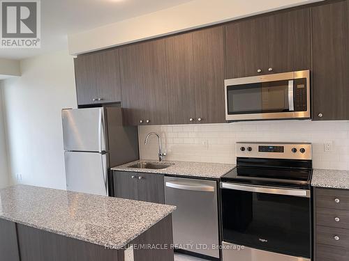 214 - 1415 Dundas Street E, Oakville, ON - Indoor Photo Showing Kitchen With Stainless Steel Kitchen With Upgraded Kitchen