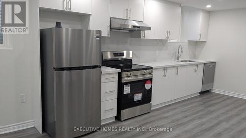 383 Mccartney Crescent, Milton, ON - Indoor Photo Showing Kitchen With Upgraded Kitchen