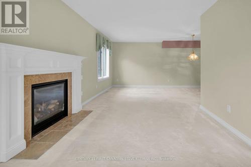 4 - 152 Albert Street, London, ON - Indoor Photo Showing Living Room With Fireplace