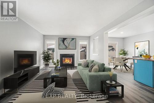 2651 Baynes Sound Way, Ottawa, ON - Indoor Photo Showing Living Room With Fireplace