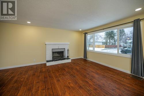 757 Youngs Avenue, Prince George, BC - Indoor Photo Showing Living Room With Fireplace