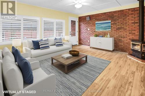 48 Debora Drive, Grimsby, ON - Indoor Photo Showing Living Room With Fireplace