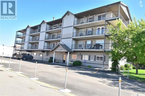 204 122 Government Road Ne, Weyburn, SK - Outdoor With Balcony With Facade