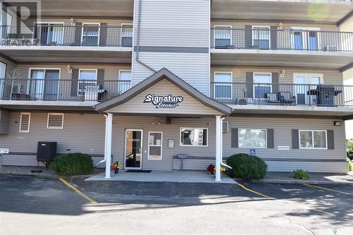 204 122 Government Road Ne, Weyburn, SK - Outdoor With Balcony With Facade