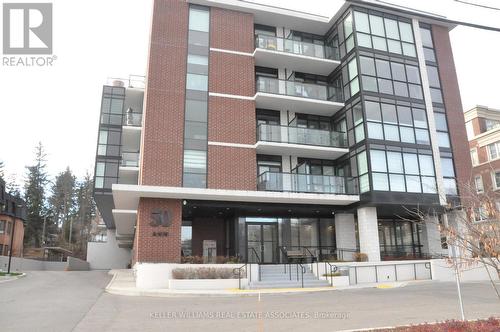 212 - 50 Ann Street, Caledon, ON - Outdoor With Balcony With Facade