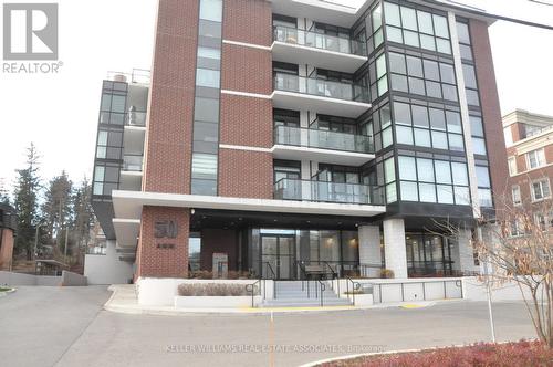 212 - 50 Ann Street, Caledon, ON - Outdoor With Balcony With Facade