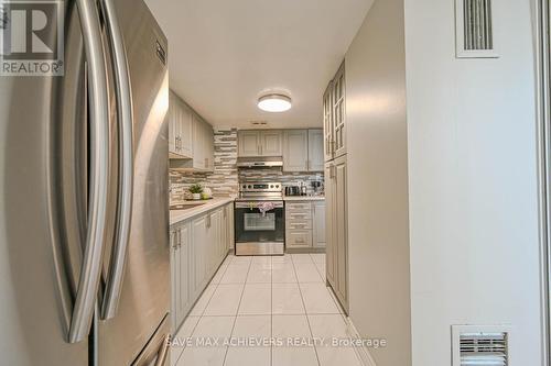 403 - 21 Markbrook Lane, Toronto, ON - Indoor Photo Showing Kitchen With Upgraded Kitchen