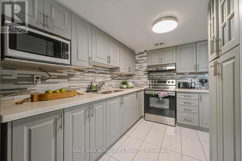 403 - 21 Markbrook Lane, Toronto, ON - Indoor Photo Showing Kitchen With Double Sink With Upgraded Kitchen