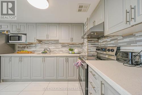 403 - 21 Markbrook Lane, Toronto, ON - Indoor Photo Showing Kitchen With Upgraded Kitchen