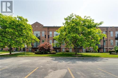 View of building exterior - 262 Dundas Street E Unit# 317, Hamilton, ON - Outdoor With Facade