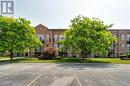 View of building exterior - 262 Dundas Street E Unit# 317, Hamilton, ON  - Outdoor With Facade 