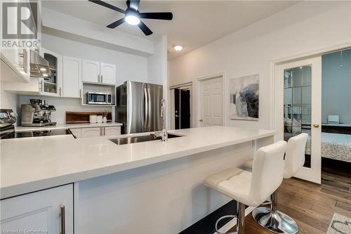 262 Dundas Street E Unit# 317, Hamilton, ON - Indoor Photo Showing Kitchen With Double Sink