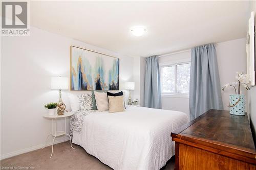 View of carpeted bedroom - 79 Braeheid Avenue Avenue Unit# 6, Hamilton, ON - Indoor Photo Showing Bedroom