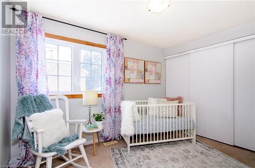 Bedroom featuring a closet and a nursery area - 79 Braeheid Avenue Avenue Unit# 6, Hamilton, ON - Indoor Photo Showing Bedroom