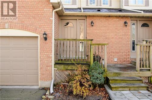 Doorway to property featuring a garage - 79 Braeheid Avenue Avenue Unit# 6, Hamilton, ON - Outdoor With Exterior