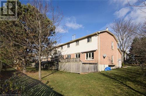 Rear view of property featuring a yard - 79 Braeheid Avenue Avenue Unit# 6, Hamilton, ON - Outdoor