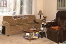 21 Mcgee Crescent, Saskatoon, SK  - Indoor Photo Showing Living Room 