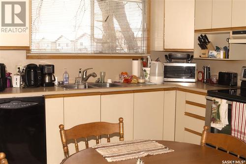 21 Mcgee Crescent, Saskatoon, SK - Indoor Photo Showing Kitchen With Double Sink