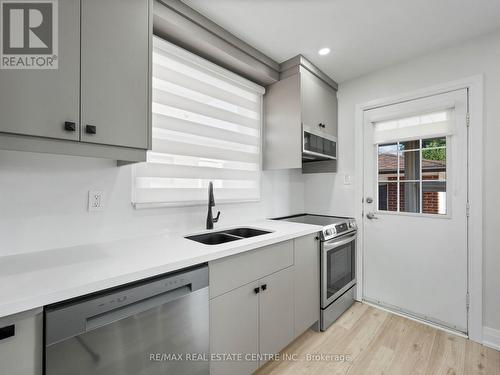 107 Lomar Drive, Toronto, ON - Indoor Photo Showing Kitchen With Double Sink