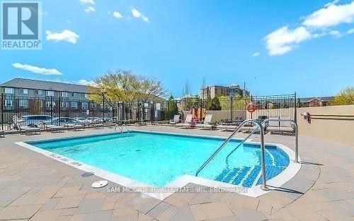 813 - 220 Forum Drive, Mississauga, ON - Outdoor With In Ground Pool