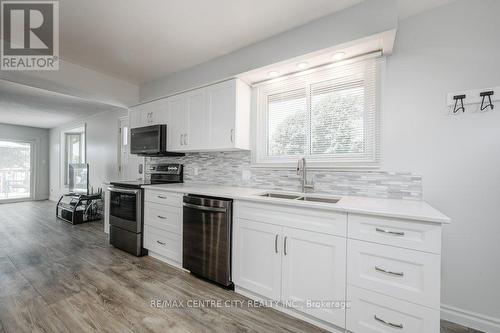 732 Salter Avenue, Woodstock (Woodstock - South), ON - Indoor Photo Showing Kitchen With Double Sink