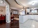 230 - 4658 Drummond Road, Niagara Falls (211 - Cherrywood), ON  - Indoor Photo Showing Kitchen 