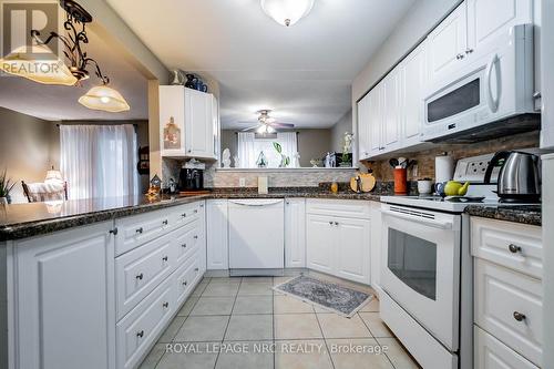 230 - 4658 Drummond Road, Niagara Falls (211 - Cherrywood), ON - Indoor Photo Showing Kitchen