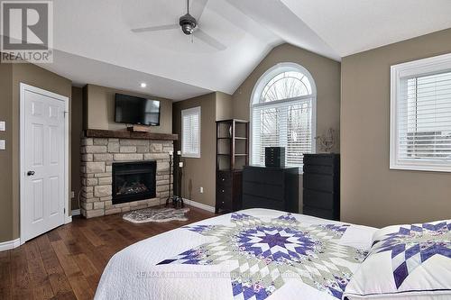 34 Davis Street, Collingwood, ON - Indoor Photo Showing Bedroom With Fireplace