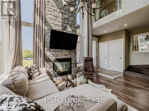 34 Carrick Trail, Gravenhurst (Muskoka (S)), ON - Indoor Photo Showing Living Room With Fireplace