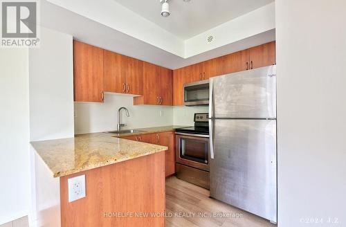 307 - 90 Orchid Place Drive, Toronto, ON - Indoor Photo Showing Kitchen With Stainless Steel Kitchen