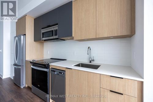 721 - 1350 Ellesmere Road, Toronto, ON - Indoor Photo Showing Kitchen With Upgraded Kitchen