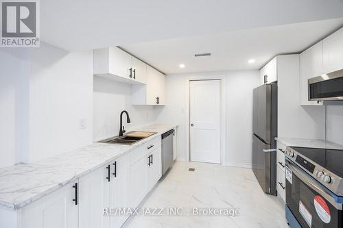 Lower - 685 Emerson Avenue, Oshawa (Donevan), ON - Indoor Photo Showing Kitchen With Stainless Steel Kitchen With Double Sink With Upgraded Kitchen