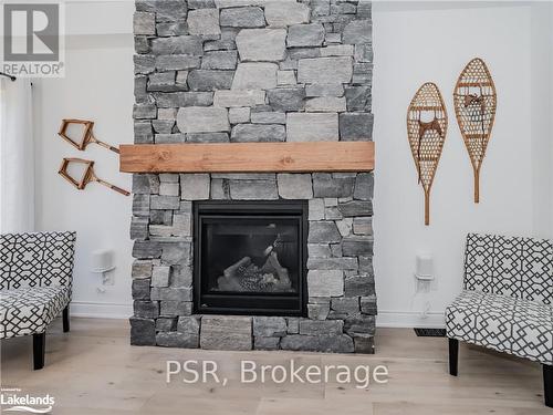 51 Rockmount Crescent, Gravenhurst (Muskoka (S)), ON - Indoor Photo Showing Living Room With Fireplace