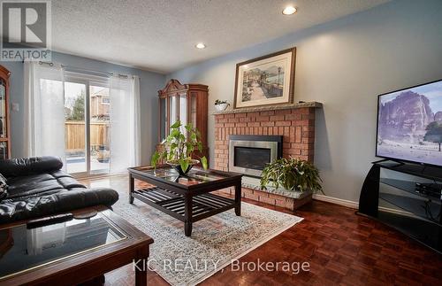 5 Hoyt Court, Whitby, ON - Indoor Photo Showing Living Room With Fireplace