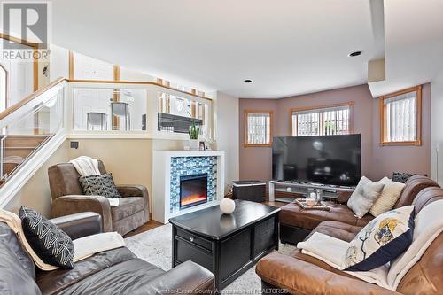 3157 Robinet, Windsor, ON - Indoor Photo Showing Living Room With Fireplace