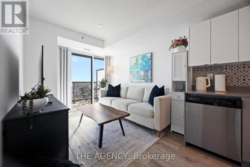 A603 - 3210 Dakota Common, Burlington (Alton), ON - Indoor Photo Showing Living Room