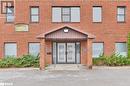 Property entrance with french doors - 108 Russell Street N, Madoc, ON 