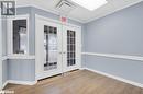 Doorway to outside with hardwood / wood-style floors, french doors, and ornamental molding - 108 Russell Street N, Madoc, ON 