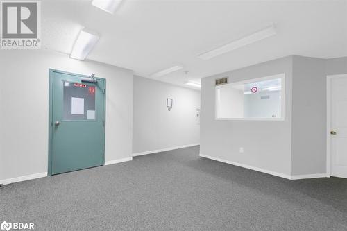 Basement with dark carpet - 108 Russell Street N, Madoc, ON - Indoor Photo Showing Other Room