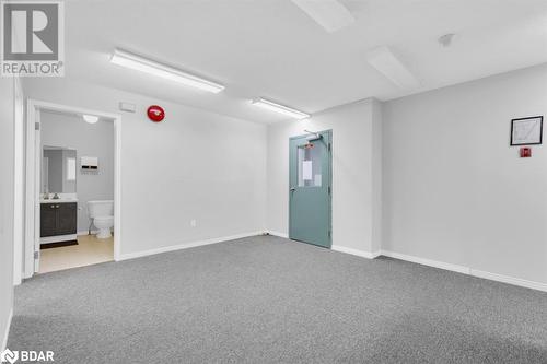 View of carpeted empty room - 108 Russell Street N, Madoc, ON - Indoor Photo Showing Other Room