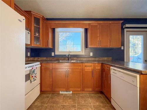 53 Wascana Drive, Brandon, MB - Indoor Photo Showing Kitchen With Double Sink