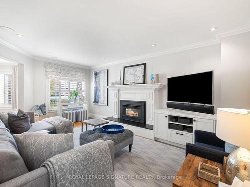 23 Hutton Cres, Caledon, ON - Indoor Photo Showing Living Room With Fireplace