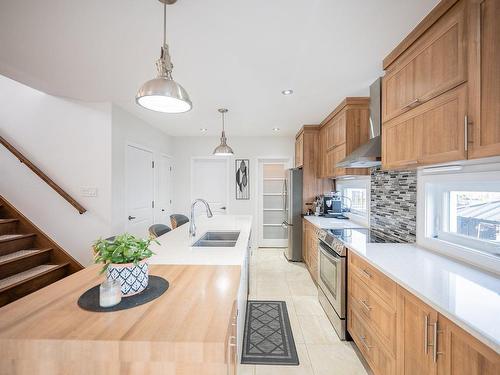 Cuisine - 50 Rue Rousseau, Saint-Constant, QC - Indoor Photo Showing Kitchen With Double Sink