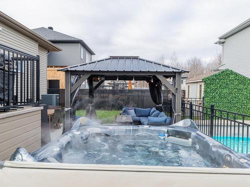 Spa - 50 Rue Rousseau, Saint-Constant, QC - Outdoor With Exterior