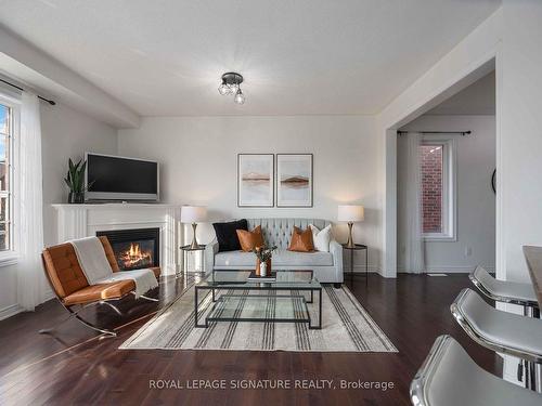 11 Gooseman Cres, Markham, ON - Indoor Photo Showing Living Room With Fireplace